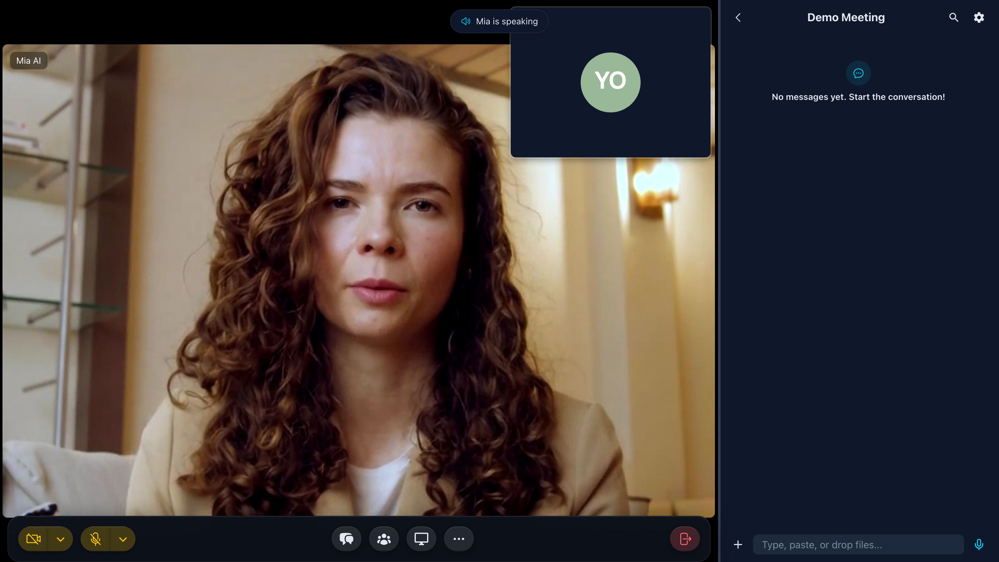A live InterMIND meeting with Mia: her video tile, and the chat where she answers in your language